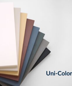 Ein Fächer aus einfarbigen Dekor-Platten zeigt verschiedene dezente Uni-Farben.